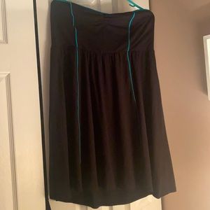 Black cotton dress with teal line detail down front